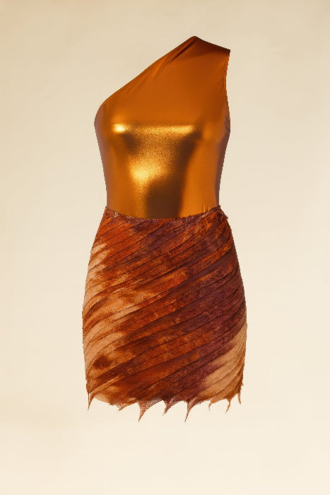 Gold one-shoulder skirt set with ruffled skirt on a beige background