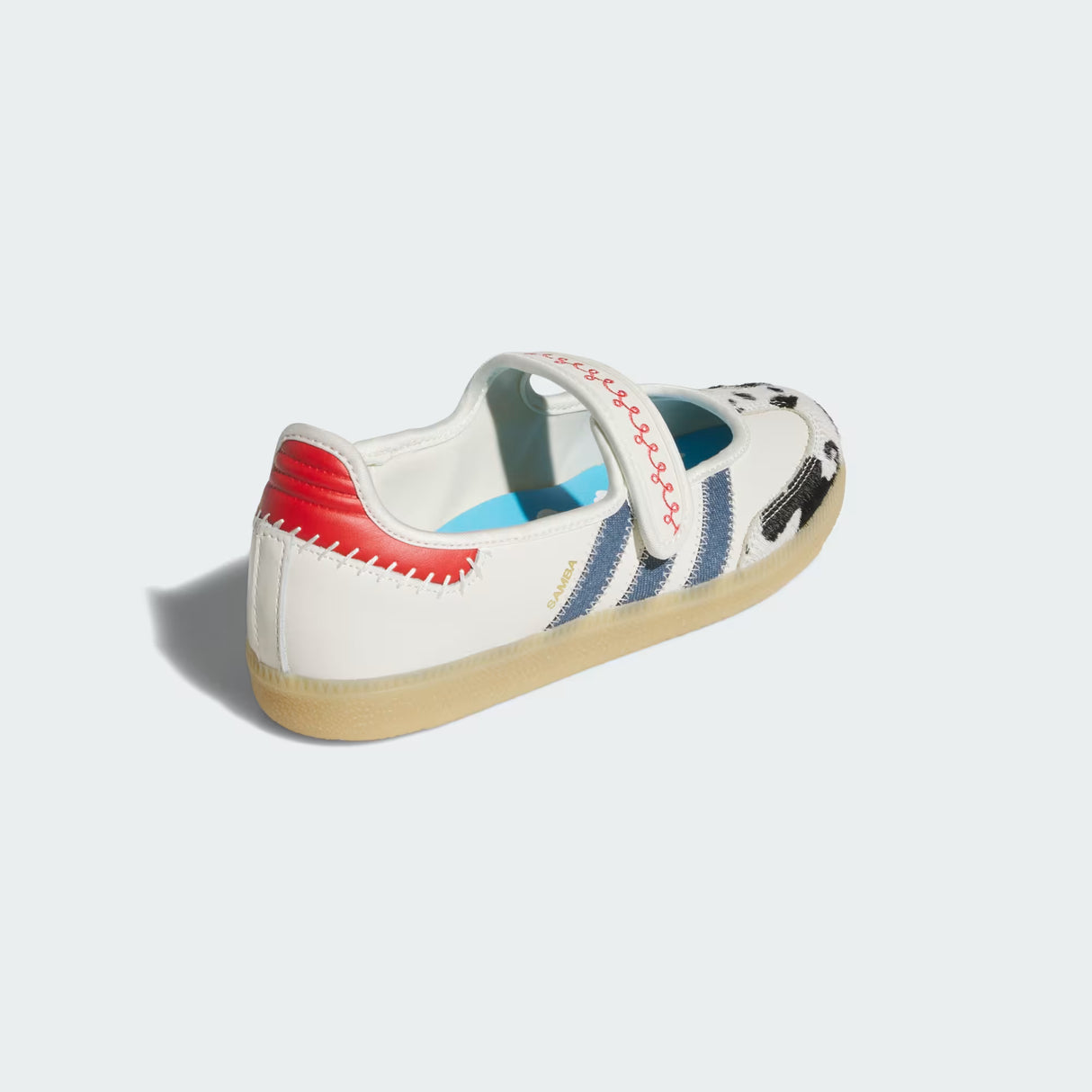 Adidas Pixar Toy Story Samba Jane Shoes with colorful sole design on a light gray background