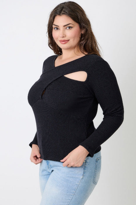 Woman wearing a black ribbed sweater with cut-out design on a white background