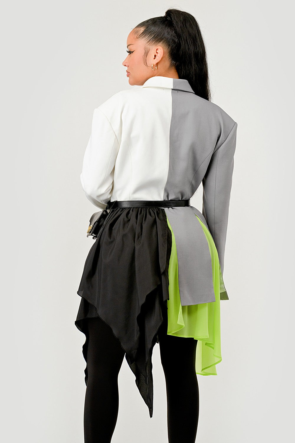 model showing back of Grey and White Colorblock Blazer with Layered Neon Green and Black Skirt Detail – Avant-Garde Statement Jacket