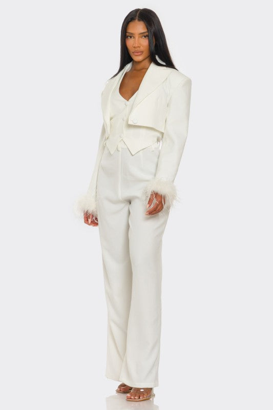 Person wearing a white suit on a white background