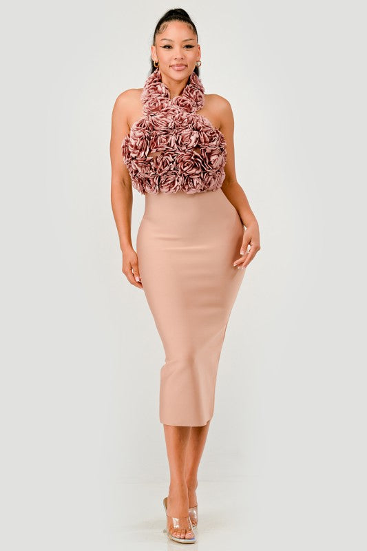 Woman wearing a pink floral top bodycon dress