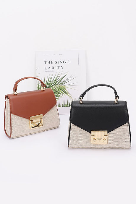Two handbags, one brown and beige, the other black and beige, on a white background.