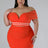 plus size model wearing orange plus size skirt set and gold jewelry