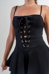 close up of Black stretch woven Stretch Lace Up Romper