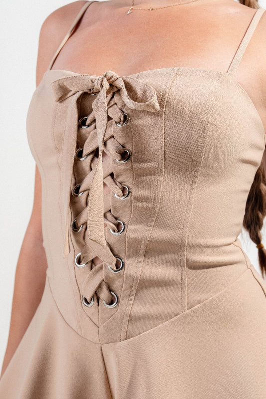 close up of lace up tie light brown stretch woven Stretch Lace Up Romper