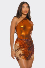 Woman wearing a bronze tie-dye skirt set on a white background
