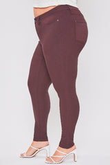 Maroon pants worn by a person on a white background