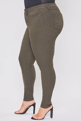Olive green pants worn by a person on a white background