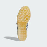 Close-up of a textured shoe sole on a light gray background