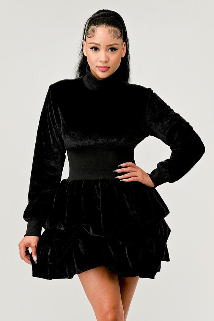 Woman wearing Black Ruffle Long Sleeve Mini Dress
