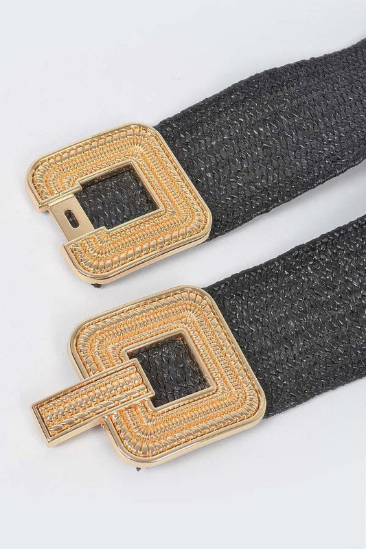 Black belt with gold buckles on a white background