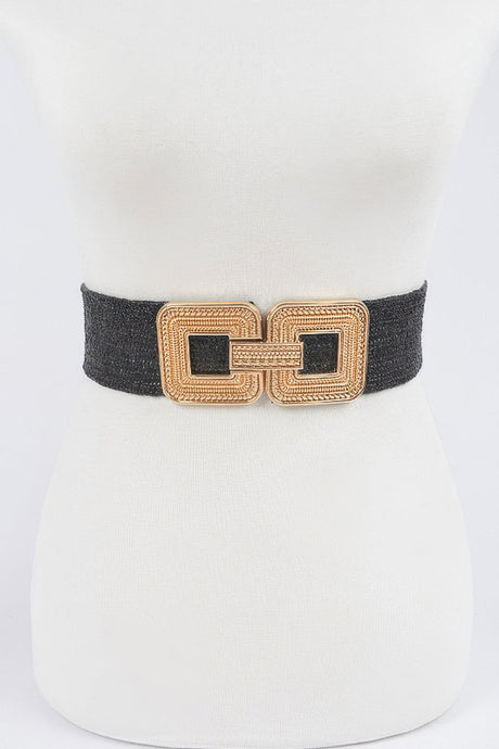 Black belt with gold buckle on a white background