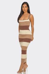 side view Woman wearing a brown striped dress on a white background