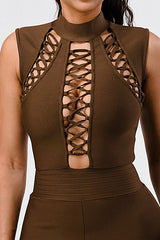 close up view of chest area of Sexy Brown Criss Cross Detail Bandage Romper