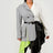 model wearing Grey and White Colorblock Blazer with Layered Neon Green and Black Skirt Detail – Avant-Garde Statement Jacket