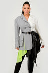 model wearing Grey and White Colorblock Blazer with Layered Neon Green and Black Skirt Detail – Avant-Garde Statement Jacket