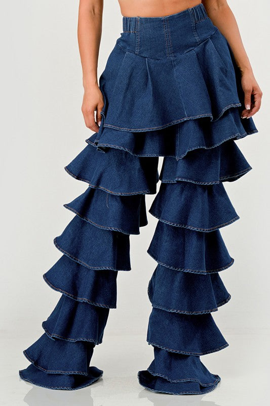 Denim ruffle pants on a white background
