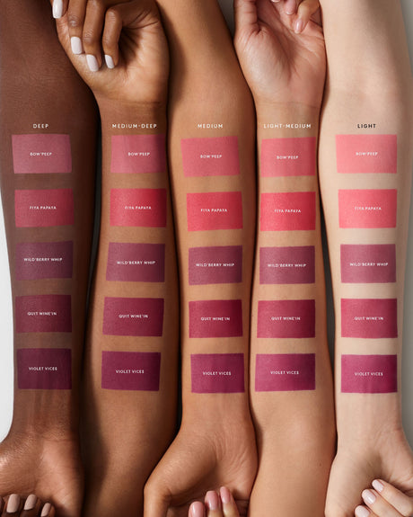 Fenty Beauty liquid blush shades on skin tones from deep to light with product names.