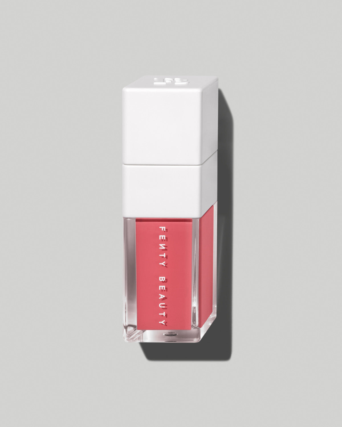 Fenty Beauty liquid blush on a gray background