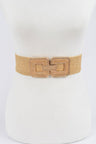 Beige woven belt on a mannequin with a white background