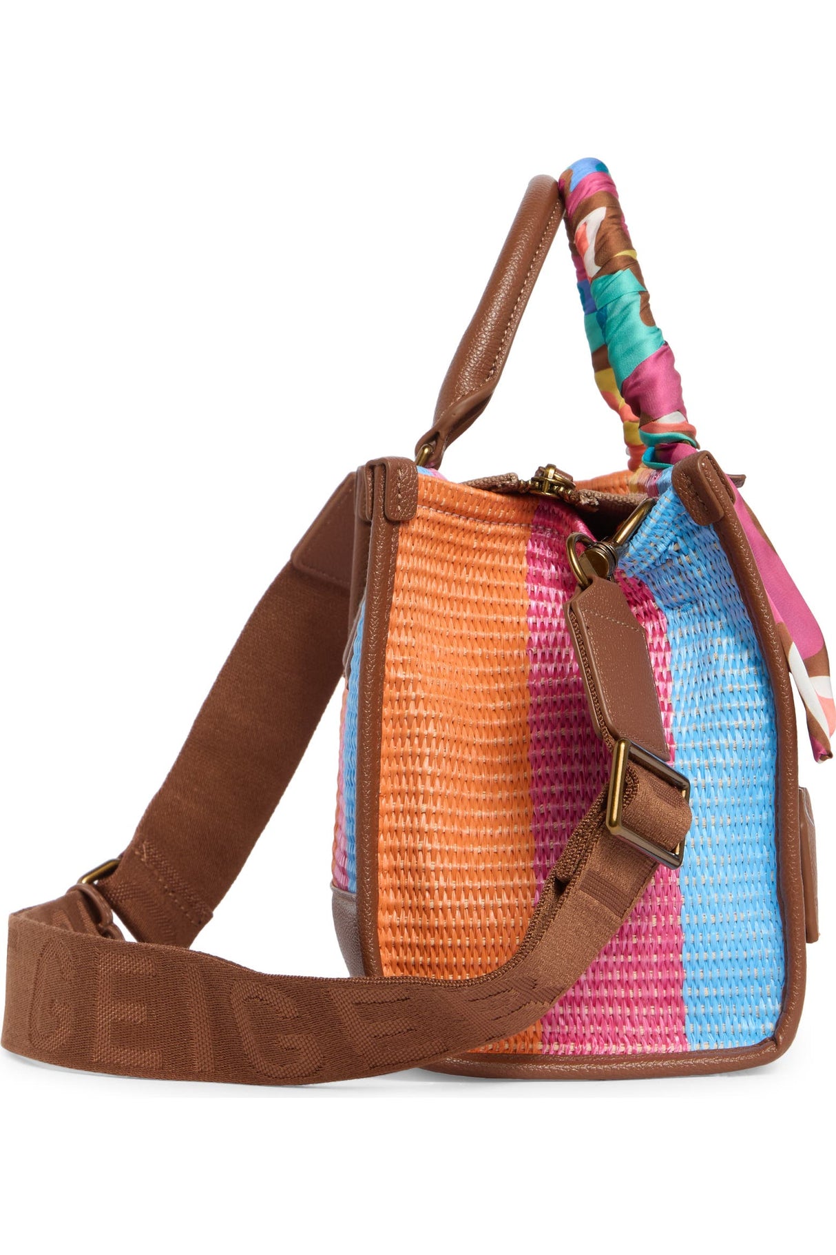 Multicolored woven Kurt Geiger handbag with brown leather straps on a white background