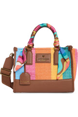 Colorful Kurt Geiger handbag with a patterned handle on a white background