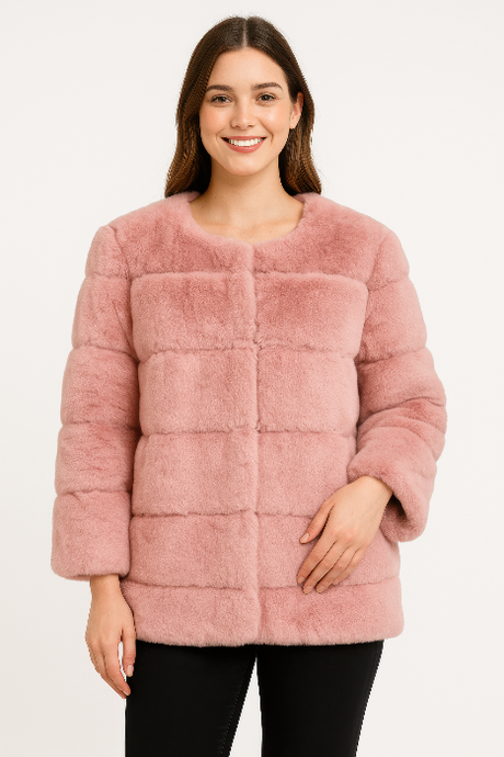 Woman wearing a pink faux fur coat on a white background