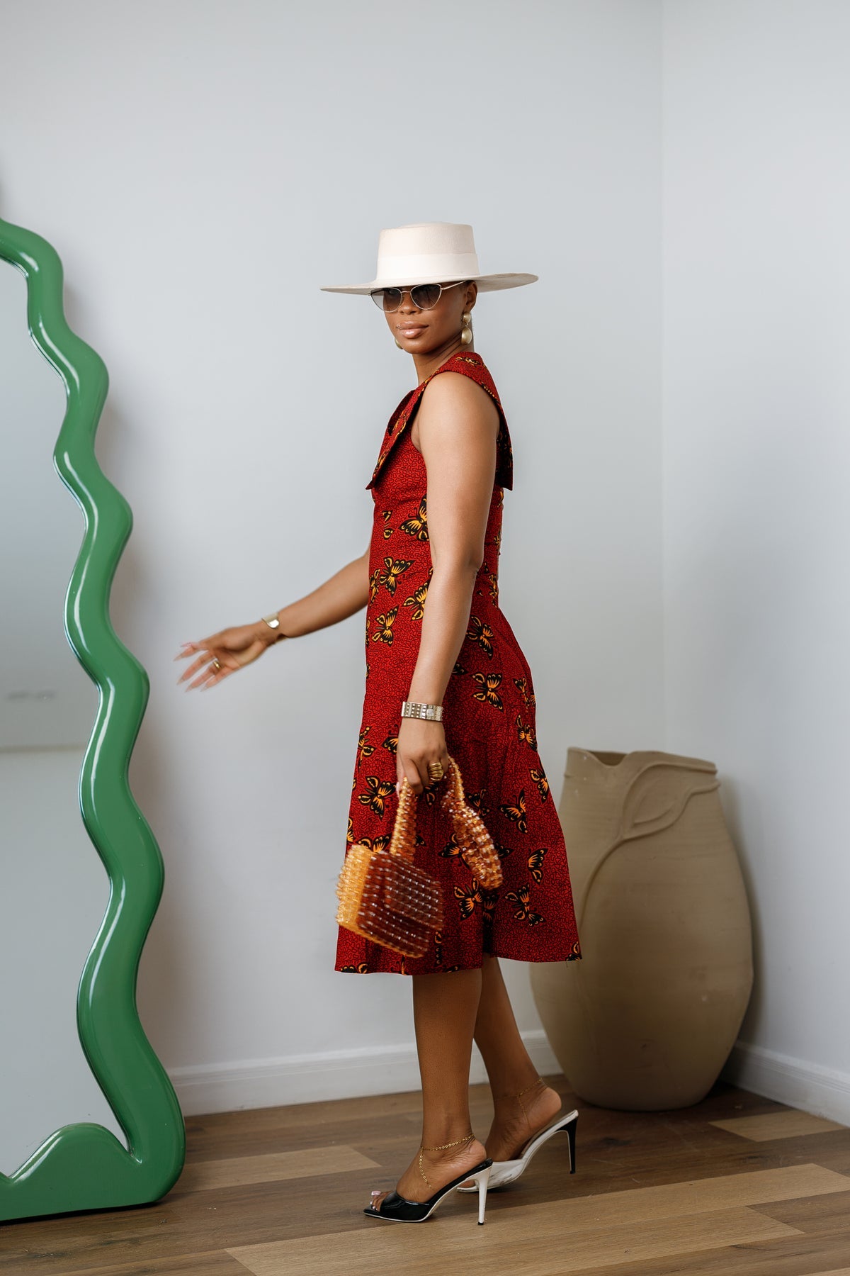 Raisa Red African Dress: Butterfly Print Sleeveless Midi Style