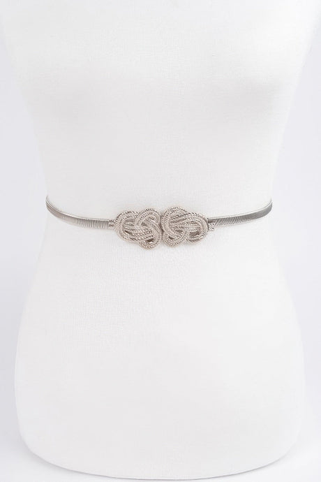 Silver belt with intricate design on a white background