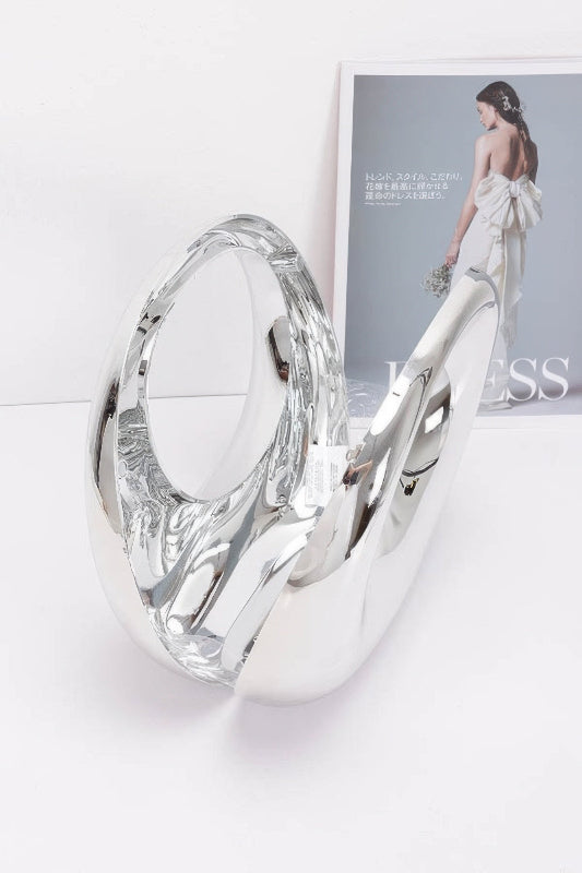 Silver metallic clutch handbag