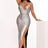 Woman wearing a silver sequin dress with a slit on a white background