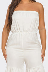 White strapless jumpsuit worn by a person on a white background