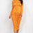 model wearing yellow orange Long Sleeve Ruched Midi Dress front view